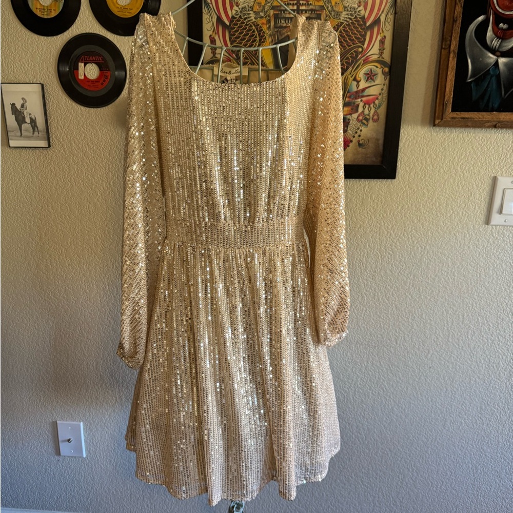Beautiful gold sequin dress with open back